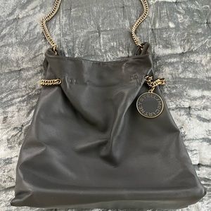 Stella McCartney gray bag with gold details